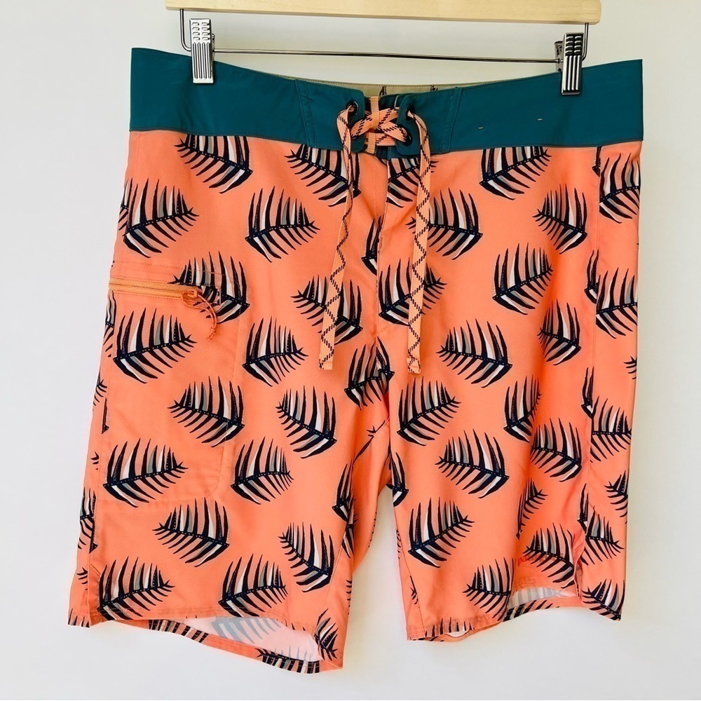 Patagonia Wavefarer boy shorts in coral palm leaves prints